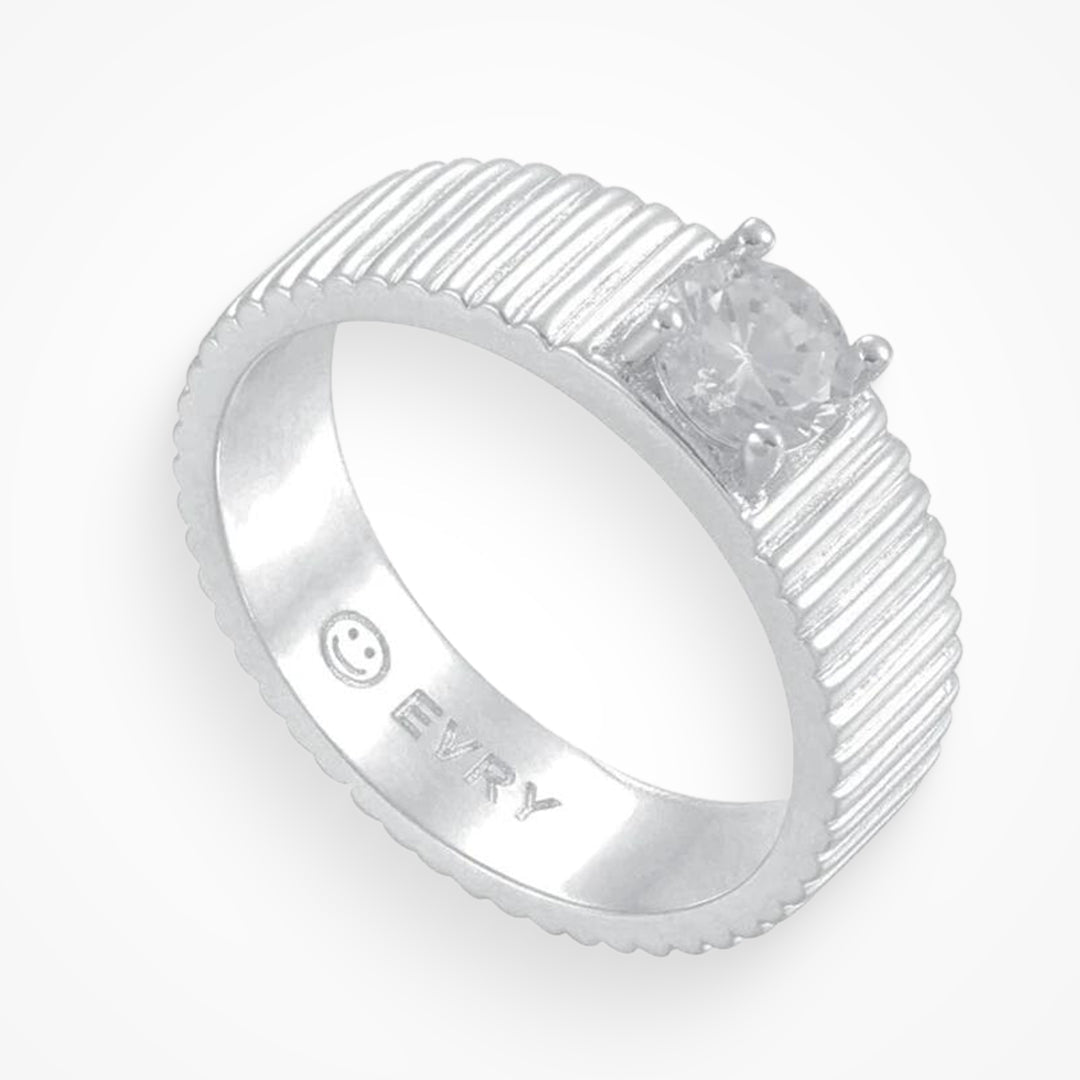 Silver ring with a diamond on a white background